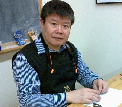 Simon Wu a Registered Piano Technician headshot